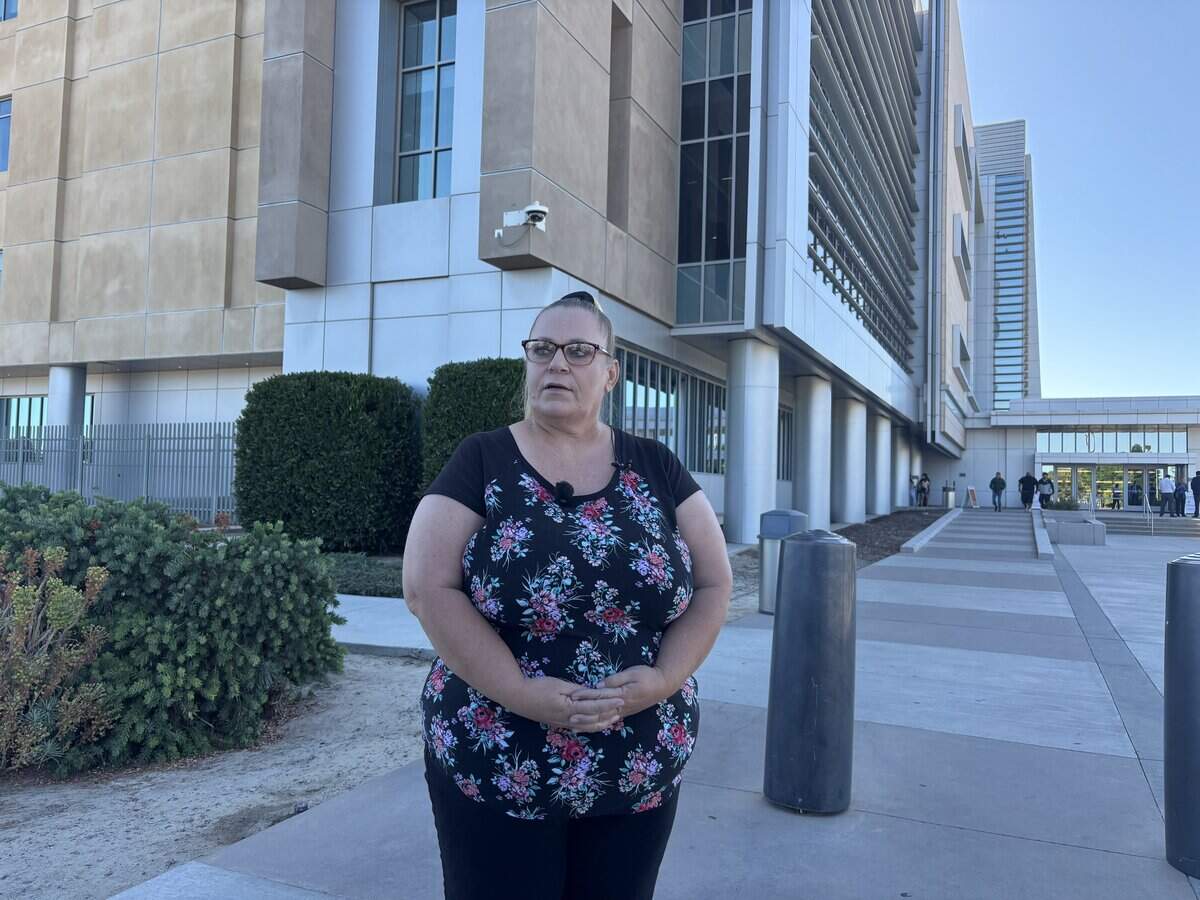 Ginger Wallis, a lifelong Avenal resident who worked on the recall, talks outside the Kings County courthouse in Hanford on Monday, June 29, 2026, after a judge continued the civil injunction case against the city until next month.