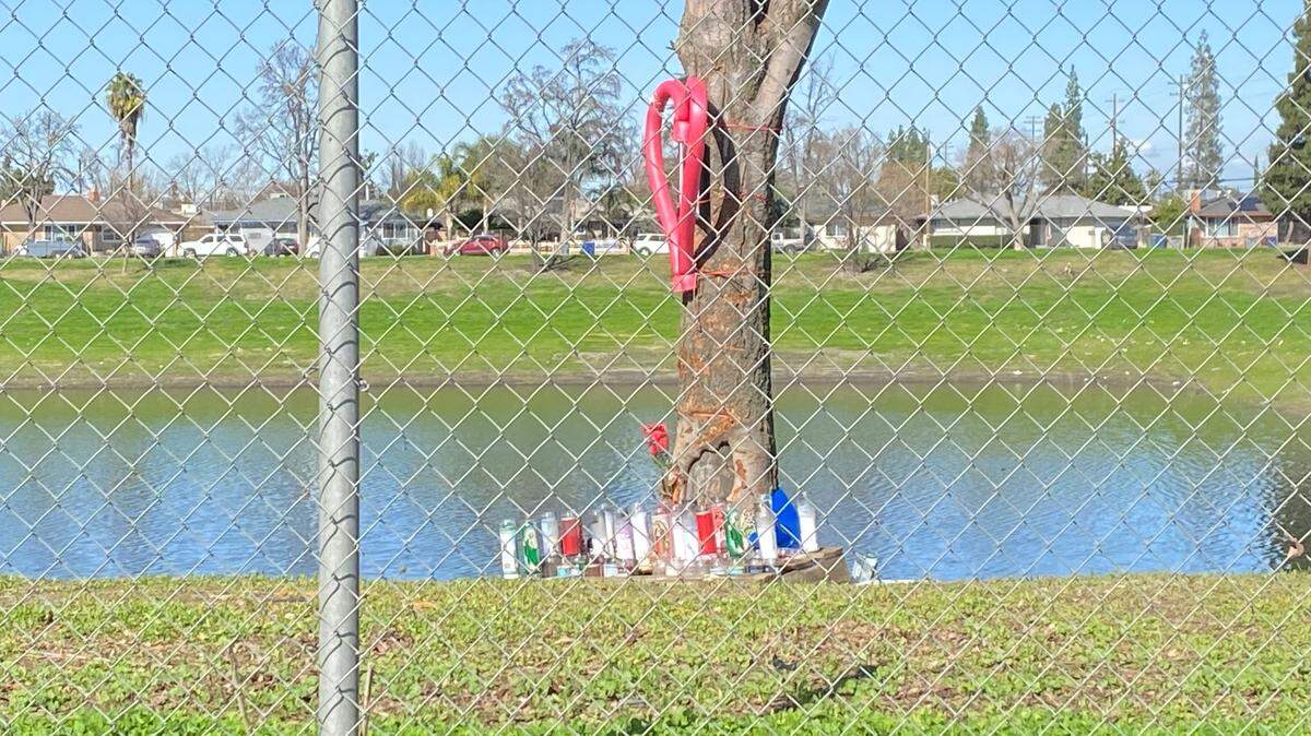 Candles sit at the site of the deadly car crash that killed Ramiro Martinez on Sunday, Feb. 18, 2024.