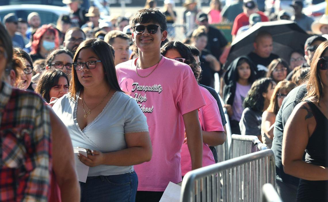 Hundreds wait for the Chance Avenue gate to open for the 2022 Big Fresno Fair’s opening day Wednesday, Oct. 5, 2022 in Fresno. The Fair returns for its annual run October 5-16 with food, entertainment, exhibits and the Midway rides and games.