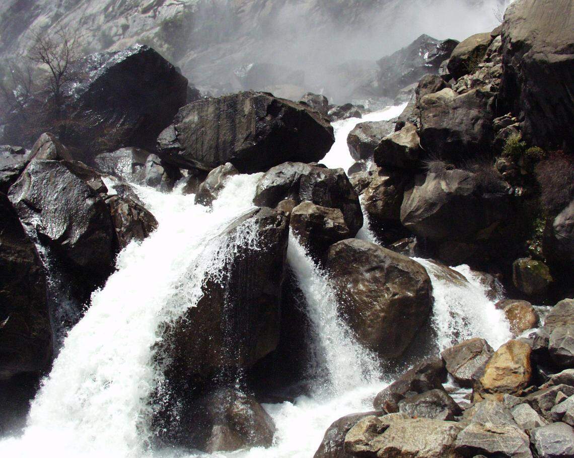 Spring runoff flows through the bottom of Wapama Fall and into the Hetch Hetchy Reservoir in Yosemite National Park, California in May 2005.