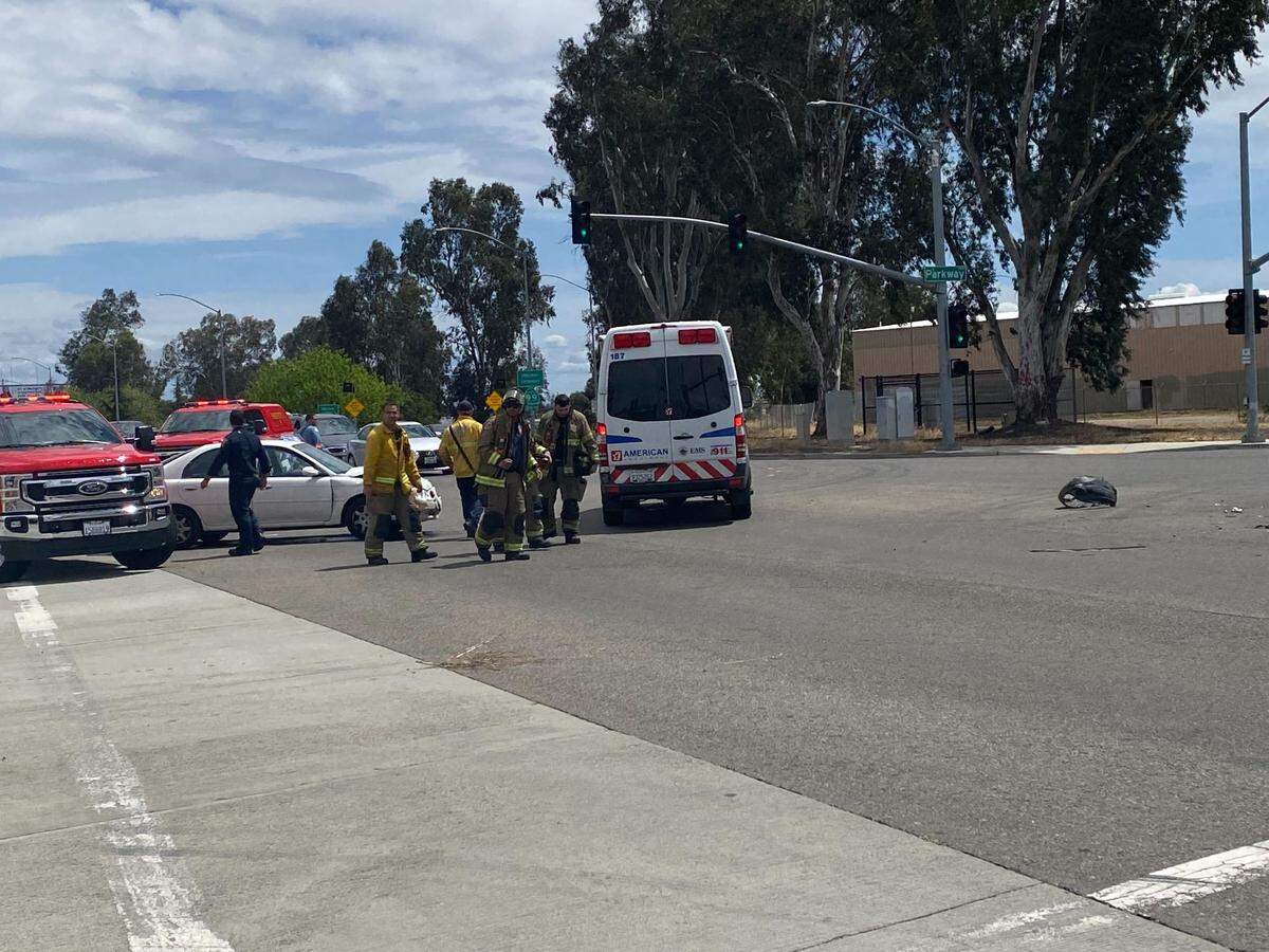 Fresno Fire crews worked the scene of a three-vehicle collision when one car ended up on its roof after another driver ran a red light on Tuesday, April 19, 2022.