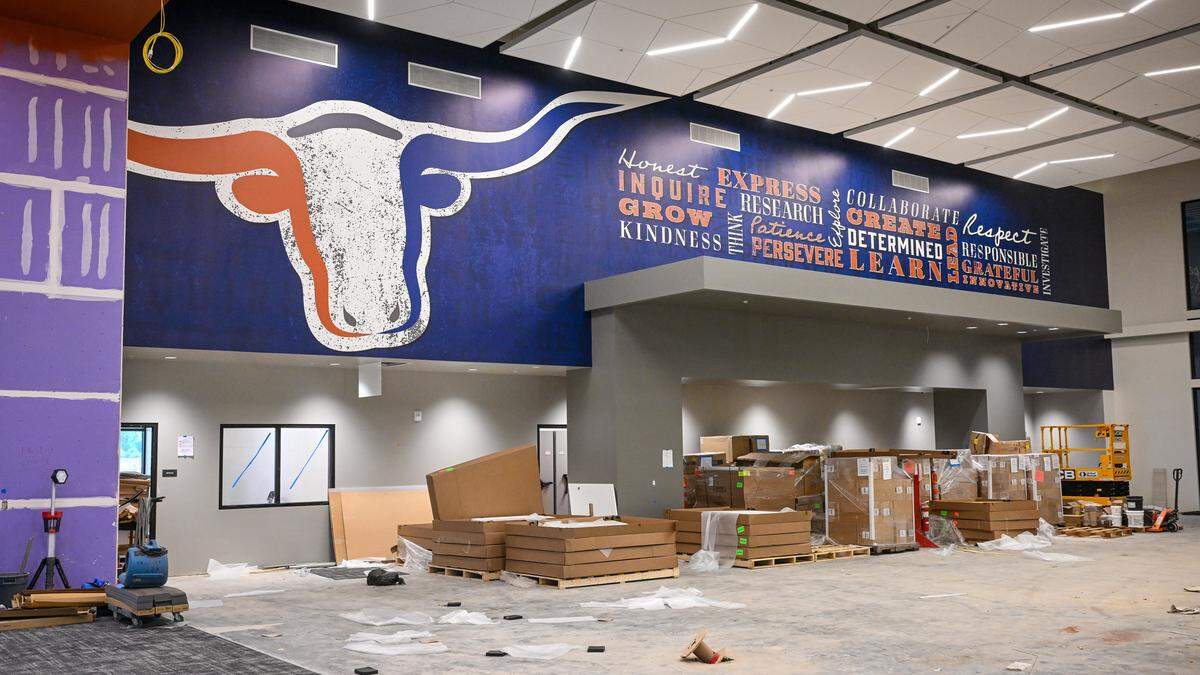 A giant longhorns mural covers the wall inside the library, located in the new administration building at the Terry P. Bradley Educational Center, on Friday, Aug. 8, 2025 just days before the start of classes on August 18. 