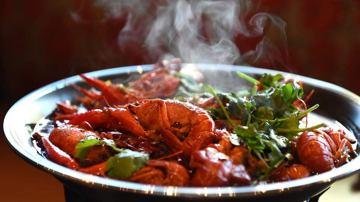 A sizzling platter of hot and spicy crawfish at Spicy J’s Specialty Chinese Cuisine in River Park.