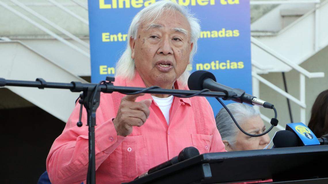 Radio Bilingüe founder/executive director Hugo Morales accepts a $2 million state allocation from Assemblymember Joaquín Arámbula and his district director, María Lemus, during a Nov. 8, 2023 ceremony at the radio station’s southeast Fresno facility.