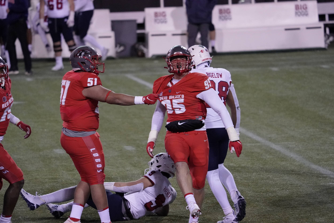 New Mexico Lobos’ defensive end Jake Saltonstall celebrates after sacking Fresno State quarterback Jake Haener in the Bulldogs’ 49-39 loss Saturday at Sam Boy Stadium in Las Vegas.