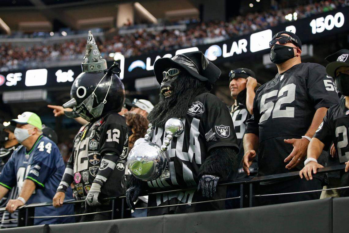Las Vegas Raiders fans during the first half of an NFL preseason football game against the Seattle Seahawks, Saturday, Aug. 14, 2021, in Las Vegas.