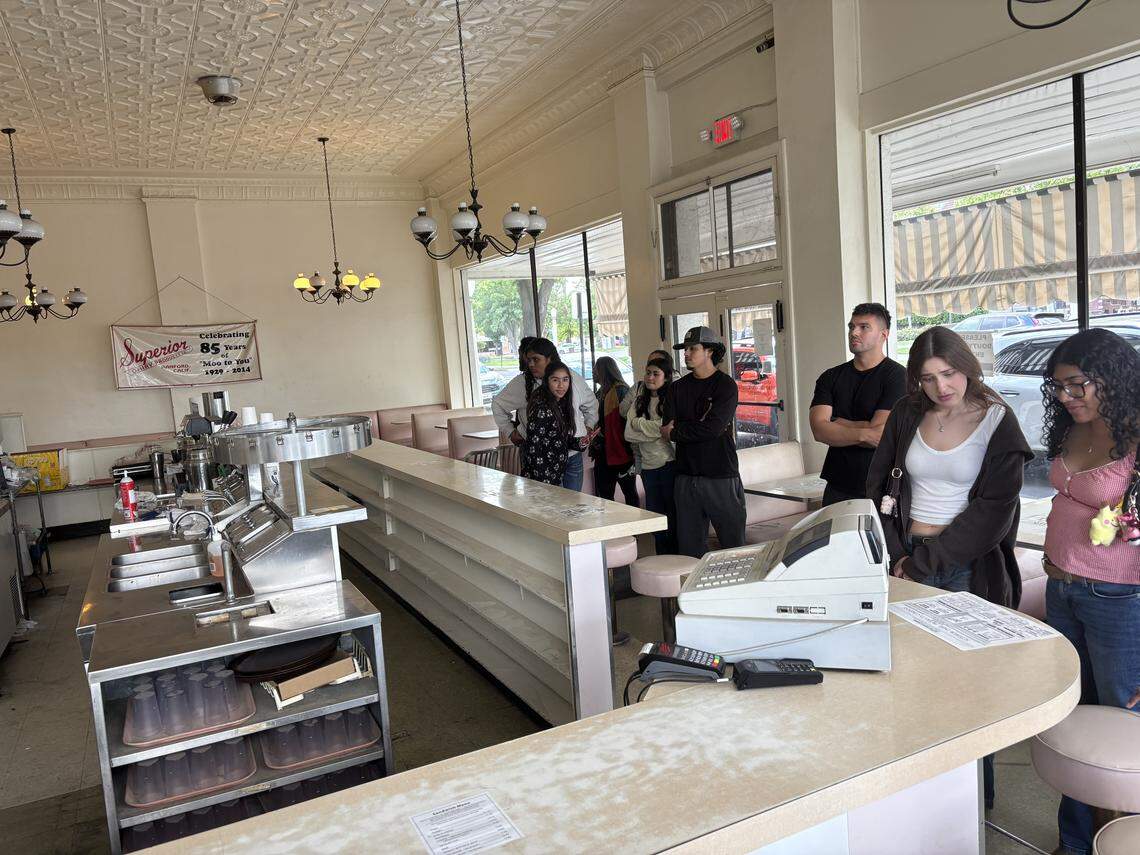 Loyal customers crowed the beloved business on its last open day for a chance to step foot inside the building one more time, get their favorite massive scoops treats, take photos of the nostalgic famous pink booths and pink stools or take home copies of the old Superior Dairy menus as souvenirs before renovations on April 12, 2026. Superior Dairy temporarily closed its doors for major renovations on April 13.