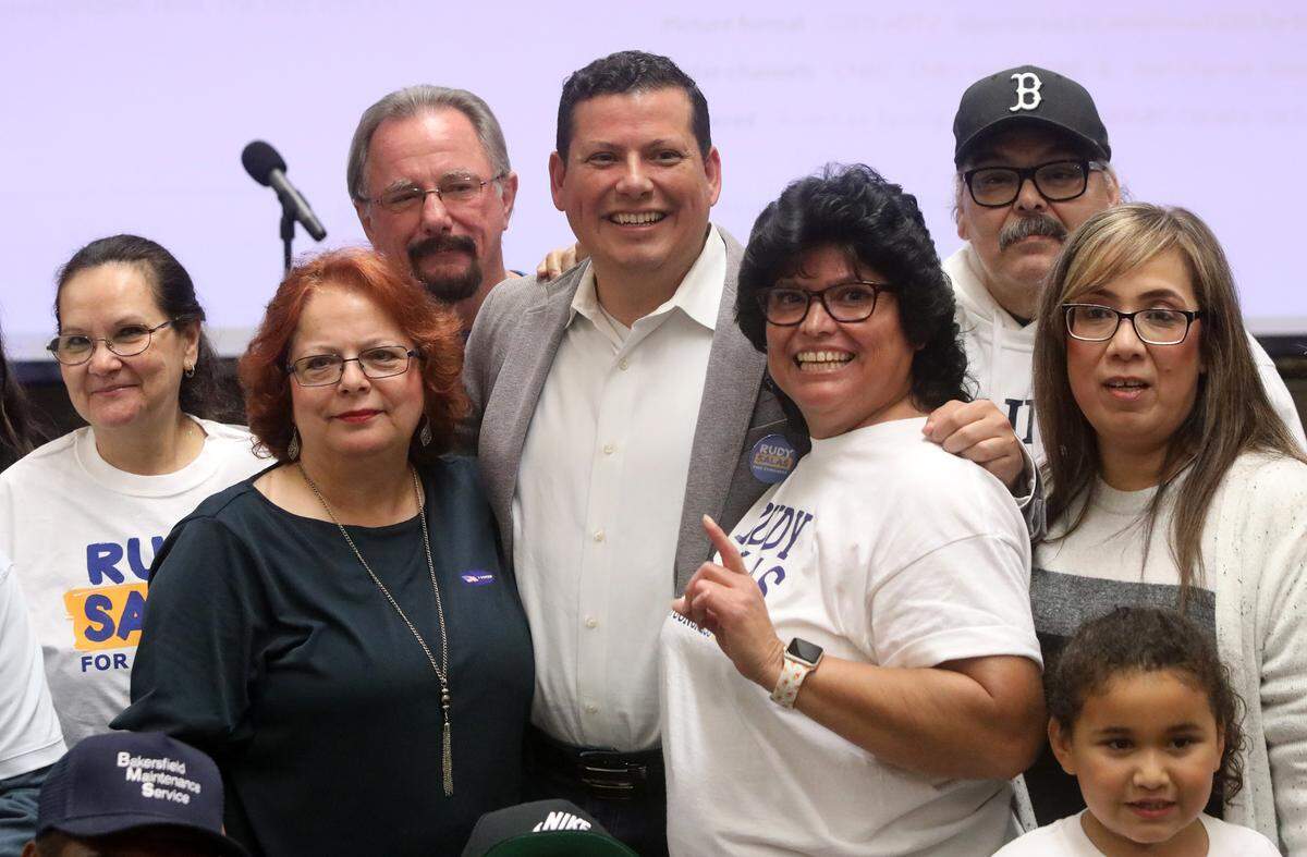 Assemblymember Rudy Salas, D-Bakersfield, takes a photo with supporters during Election Night watch party at a union hall in Bakersfield on Nov. 8, 2022. He is challenging Republican incumbent David Valadao in the newly redrawn 22nd Congressional District.
