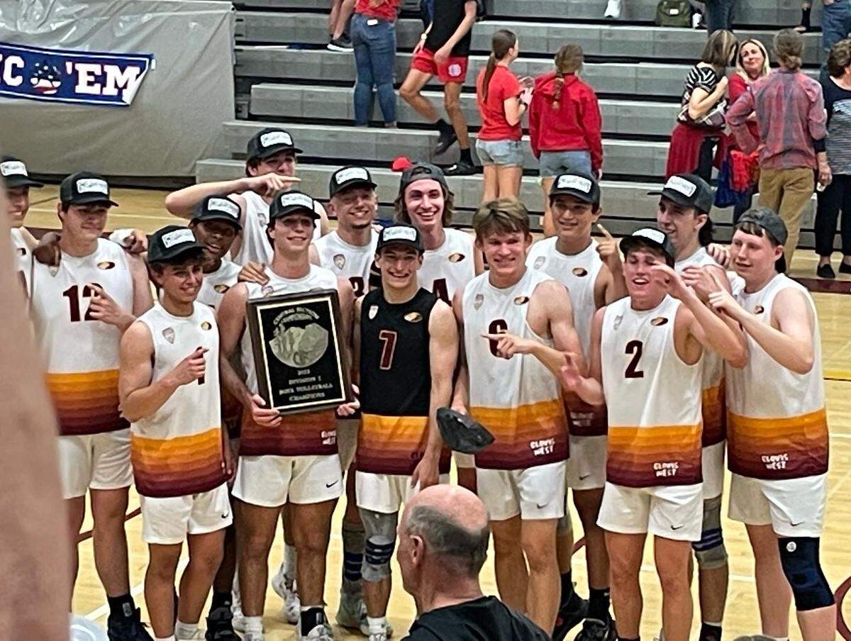 Clovis West poses after defeating Buchanan for the Central Section Division I boys volleyball championship on Thursday, May 12, 2022.