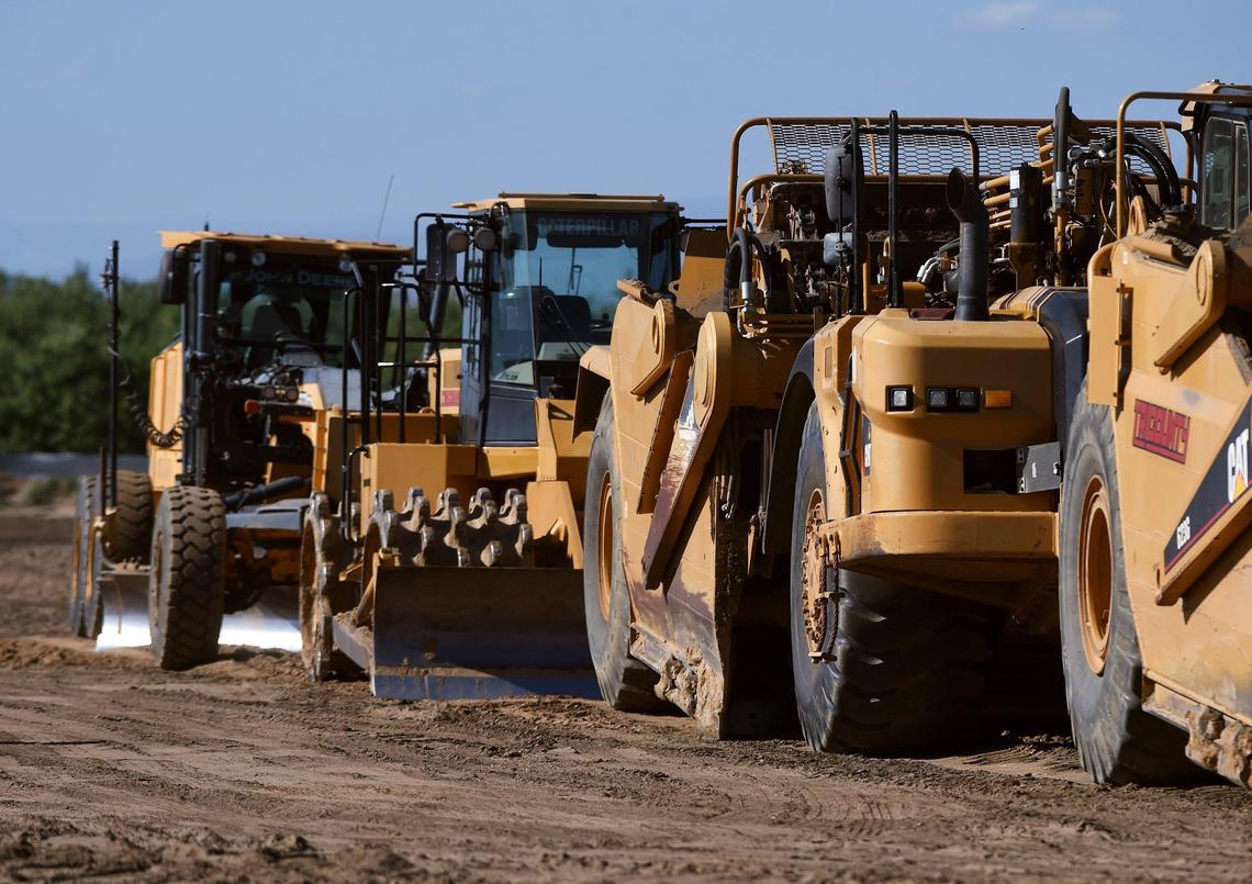 Construction equipment is seen parked on a large parcel of land north of Shepherd Avenue east of Clovis Avenue Friday June 7, 2019 in Clovis.