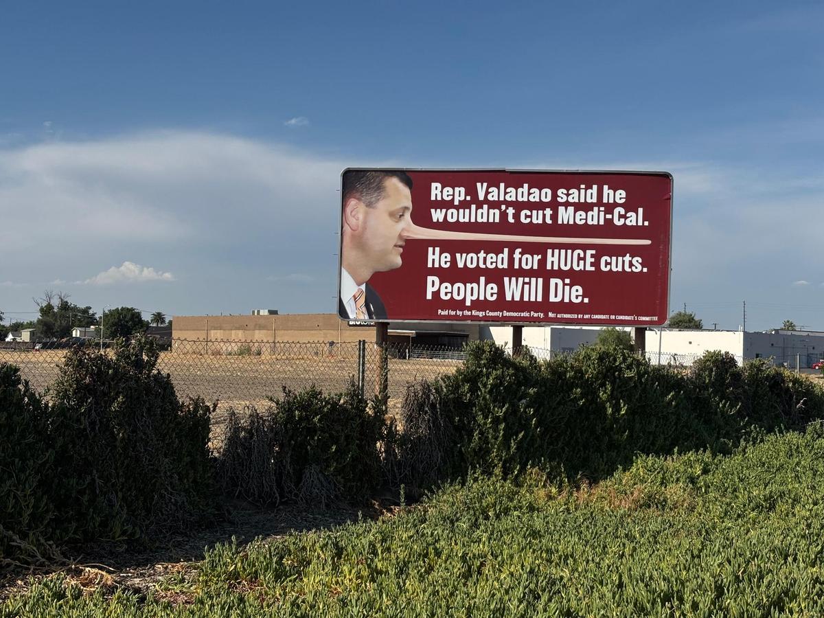 The billboard on Hwy 198, paid for by the Kings County Democratic Party, shows a photo of Rep. David Valadao with a long nose, like Pinocchio, with the words “Rep. Valadao said he wouldn’t cut Medi-Cal. He voted for HUGE cuts. People WILL Die.”