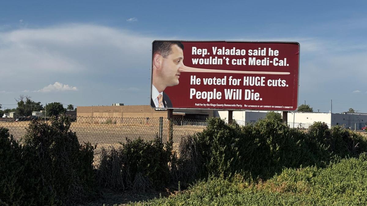 The billboard on Hwy 198, paid for by the Kings County Democratic Party, shows a photo of Rep. David Valadao with a long nose, like Pinocchio, with the words “Rep. Valadao said he wouldn’t cut Medi-Cal. He voted for HUGE cuts. People WILL Die.”