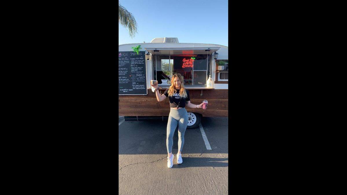 Loving Seed, a vintage food truck, sells acai bowls and smoothies.