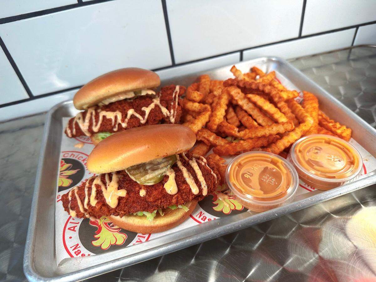Nashville hot chicken sandwiches with french fries are on the menu at Al’s Hot Chicken, which opens Saturday in Fresno.