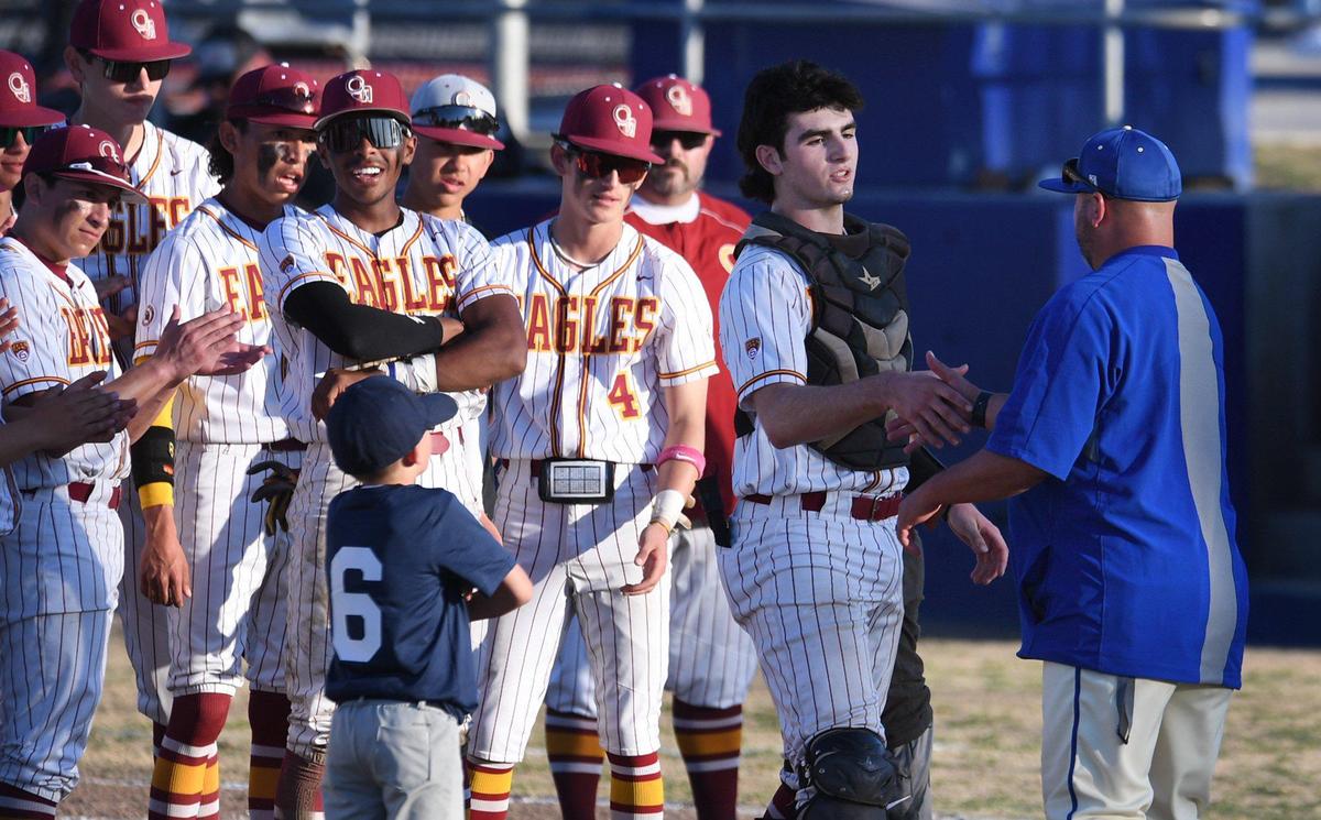 Clovis West’s Tyler Patrick, right, receives one of two MVP awards at the Coca Cola Classic baseball championship against San Joaquin Memorial Saturday, March 12, 2022 in Clovis. Clovis West ended the game defeating Memorial 9-2 for the championship.