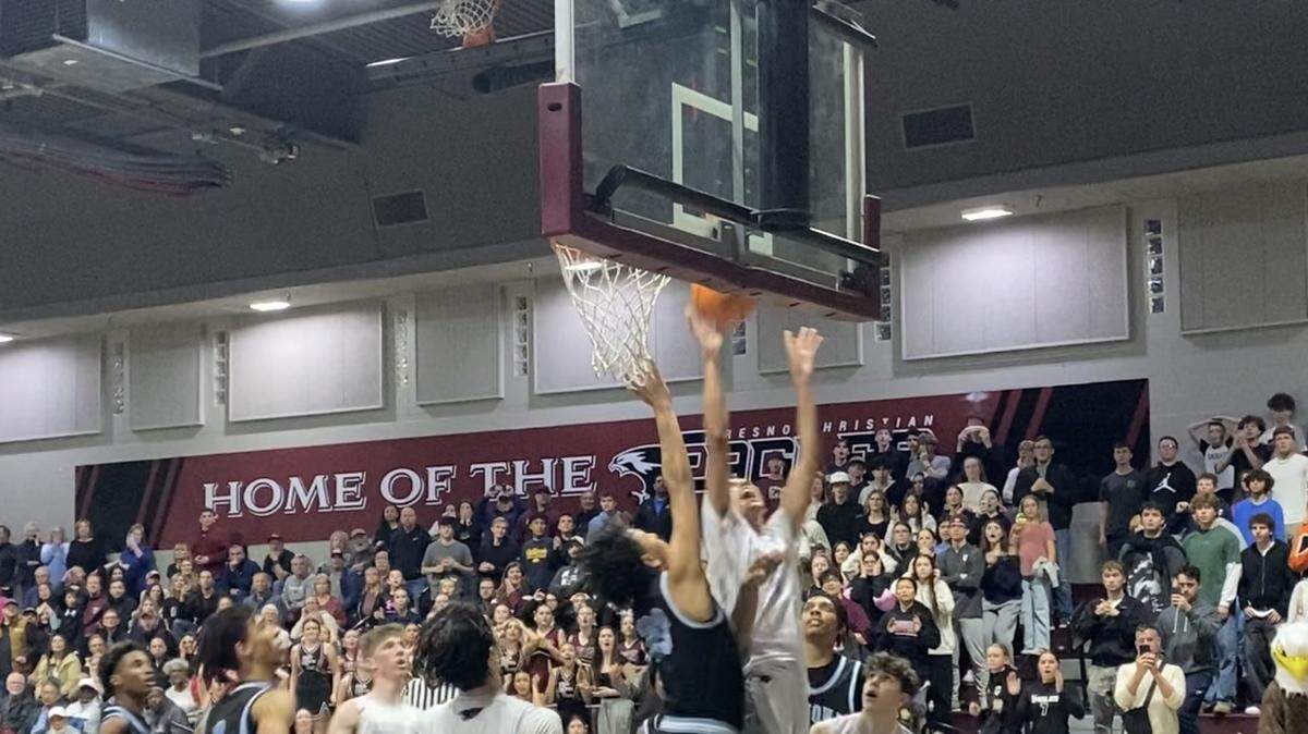 Devin Gaines makes a basket for his 1,000th career point for Fresno Christian and to secure a 63-61 victory over Ramona in CIF Southern Division IV state playoff game on Thursday, March 6, 2025.