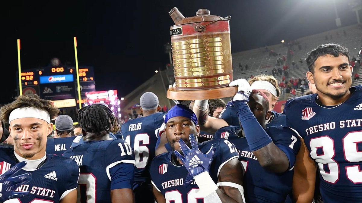 The Fresno State football tea celebrates its 32-28 win over San Diego State, pulling ahead in the final minutes to win the Battle For The Old Oil Can Saturday, Oct. 29, 2022 in Fresno.