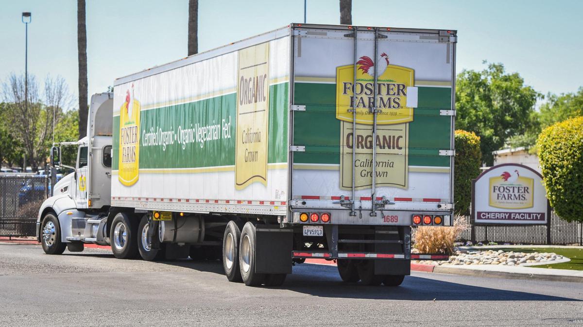 A truck pulls up to the gate at the Foster Farms Cherry Avenue facility in Fresno on Wednesday, May 26, 2021.