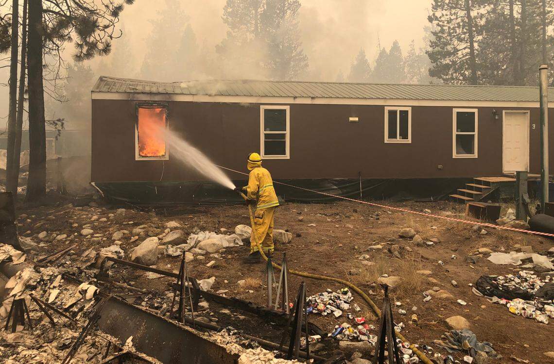 Firefighters on Wedneday morning, Sept. 9, 2020 battle blazes in the employee housing area of China Peak. The base area and hotel were intact as of 10 a.m.