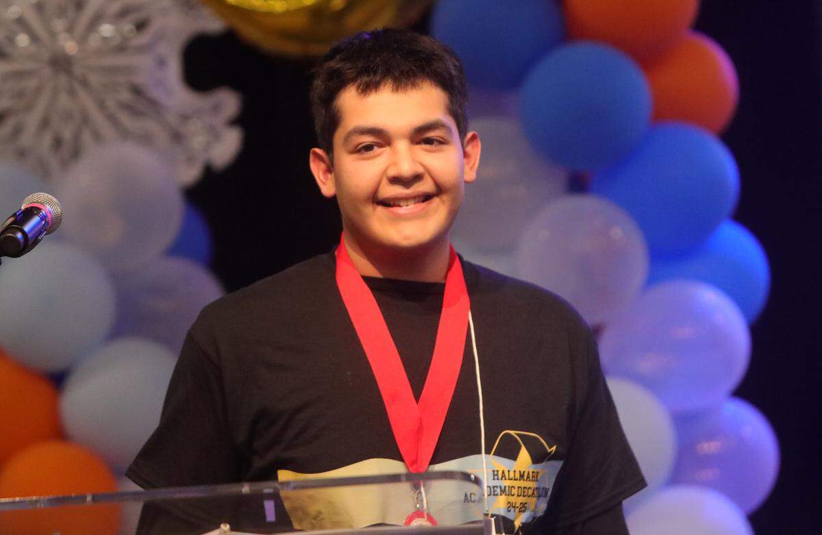 Hallmark Academy senior Axel Buchdid delivered a speech about what makes someone a hero during the 43rd annual Fresno County Academic Decathlon at Sunnyside High School on Feb. 1, 2025.