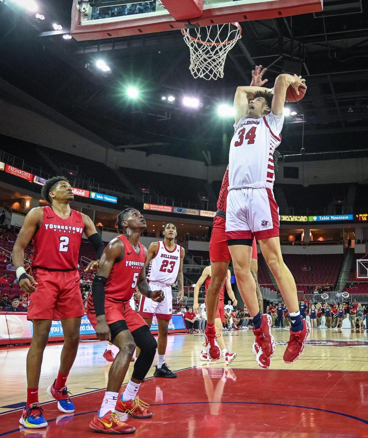 Fresno State’s Braxton Meah goes for a dunk against Youngstown State during their quarterfinal game in the 2022 Basketball Classic tournament at the Save Mart Center in Fresno on Wednesday, March 23, 2022.