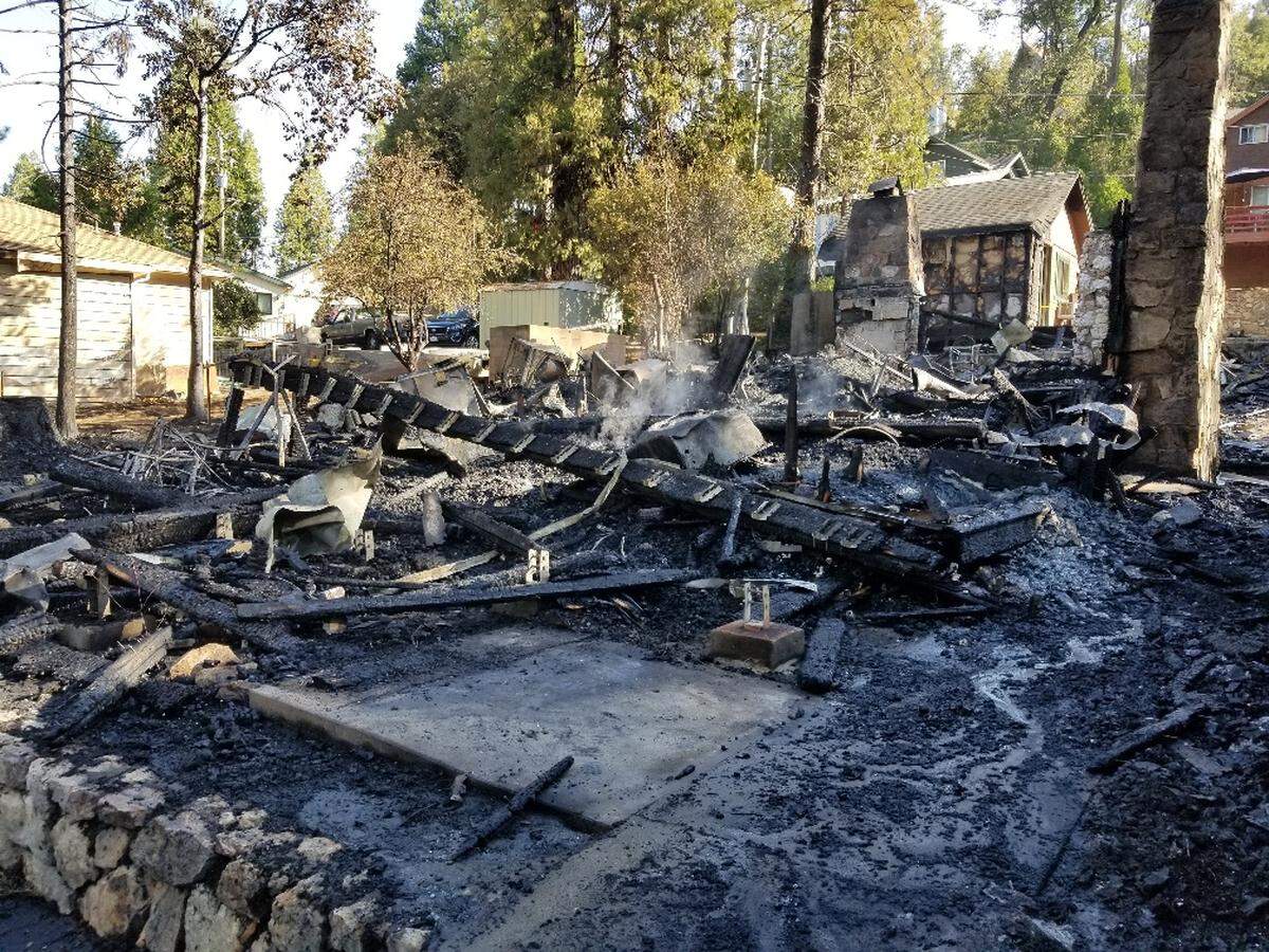 the aftermath of a fire in Bass Lake on Monday, Sept. 3, 2018.