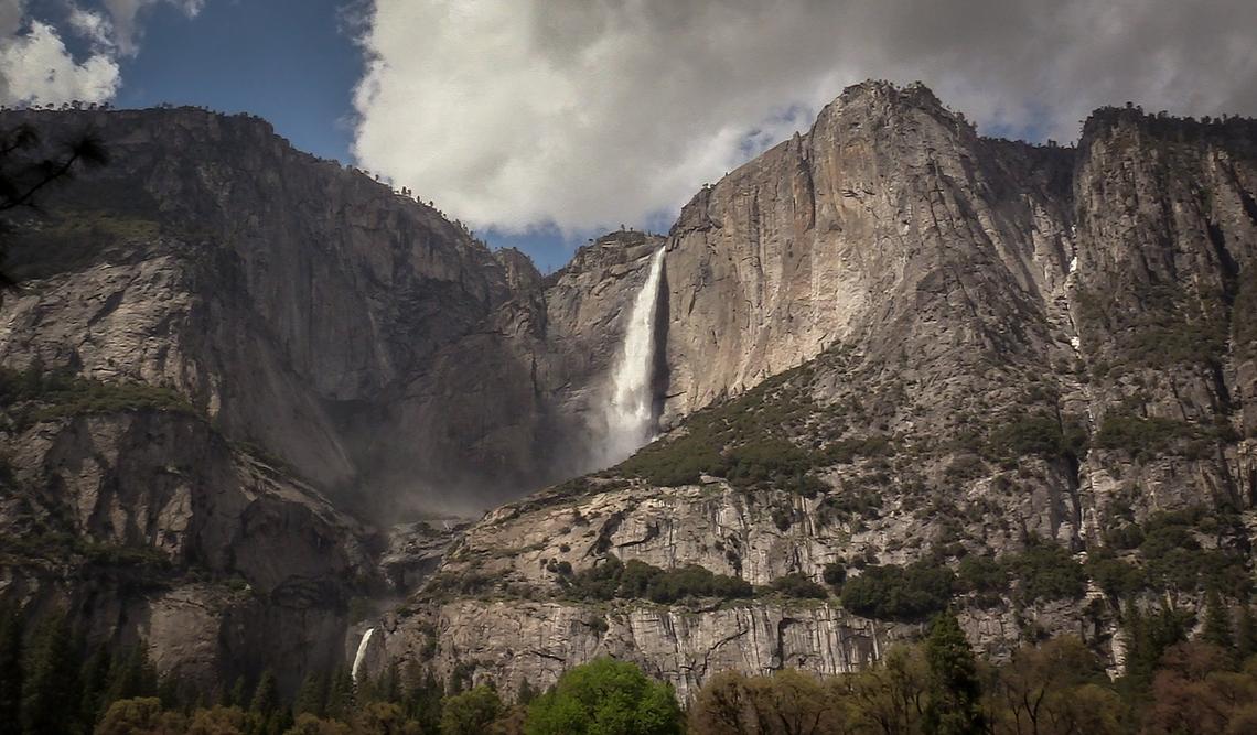 Upper and lower Yosemite Falls flow into Yosemite Valley at near peak levels on Tuesday, April 30, 2019. The Sierra Nevada snowmelt is in high gear after a bigger than normal snow year.