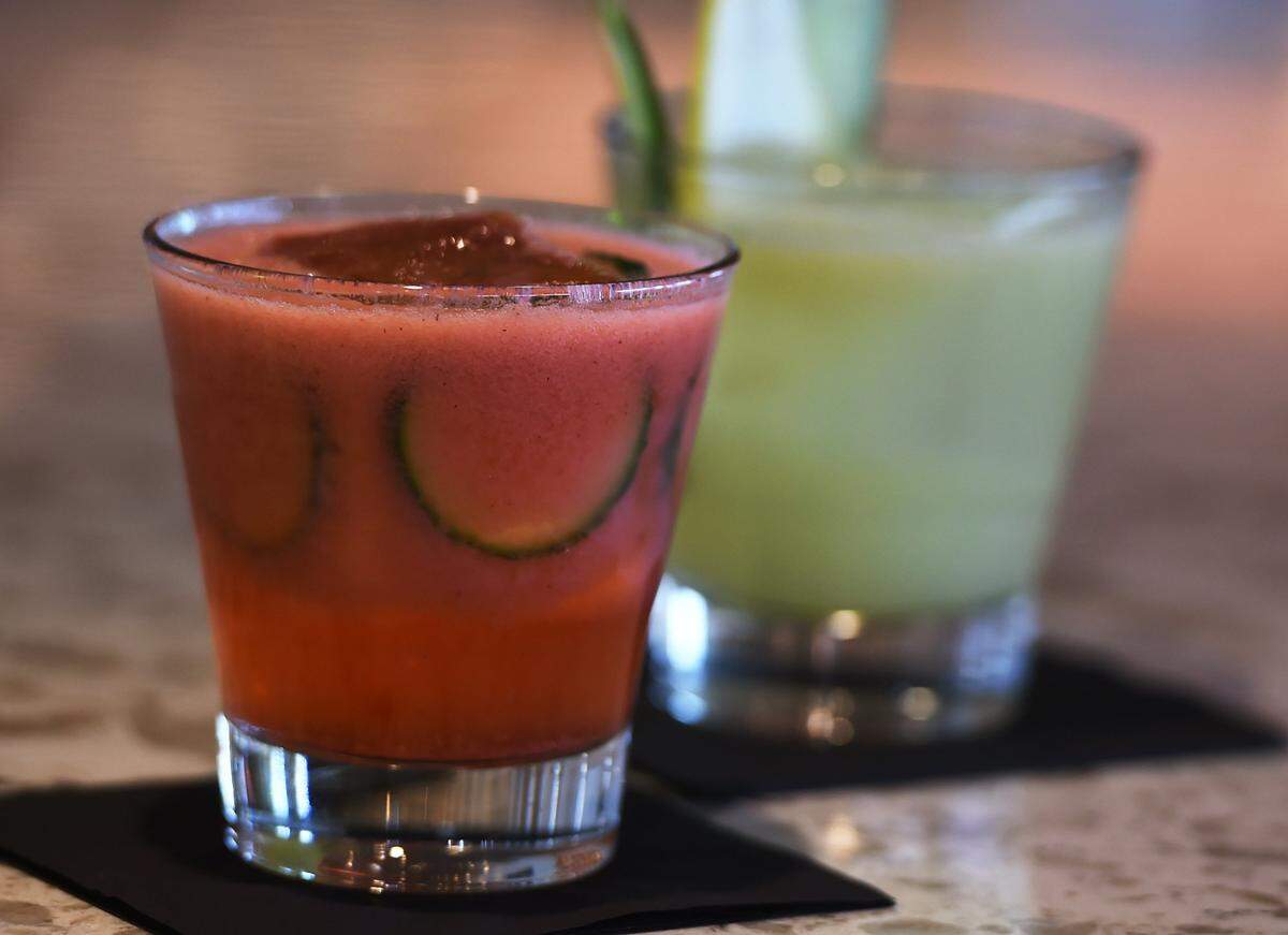 Heirloom, a new restaurant opened at Park Crossing, also offers cocktails. Seen on the left is a Tropic Thunder, to the right is the Rum P.M.C. Photographed Tuesday, Feb. 5, 2019 in Fresno.