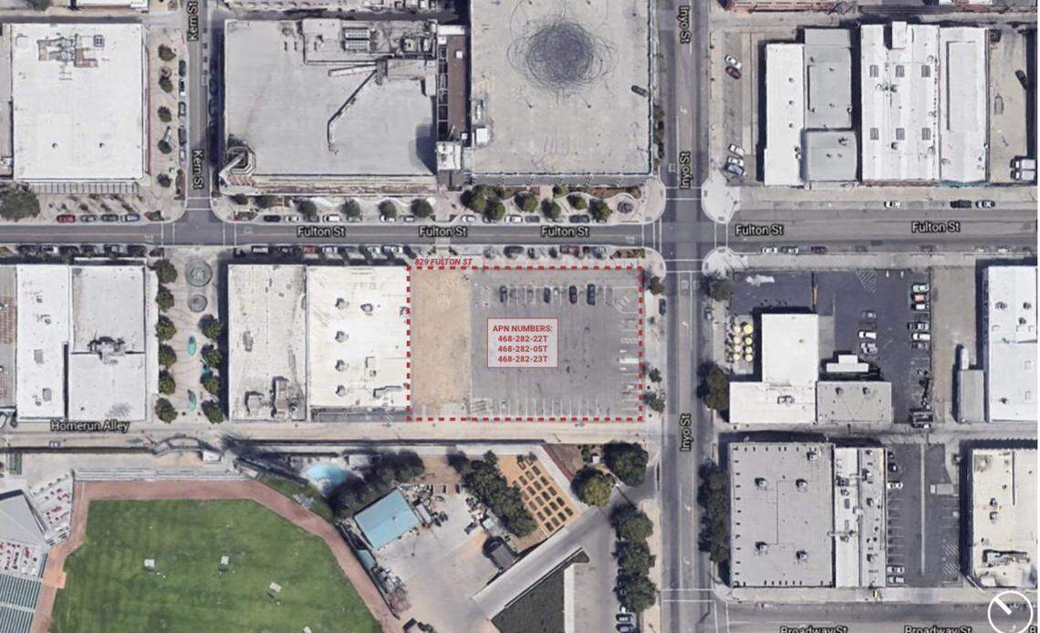 A four-story mixed use residential and retail building known as The Park is proposed for construction at the corner of Fulton and Inyo streets in downtown Fresno, California. The green area at lower left is the outfield at Chukchansi Park.