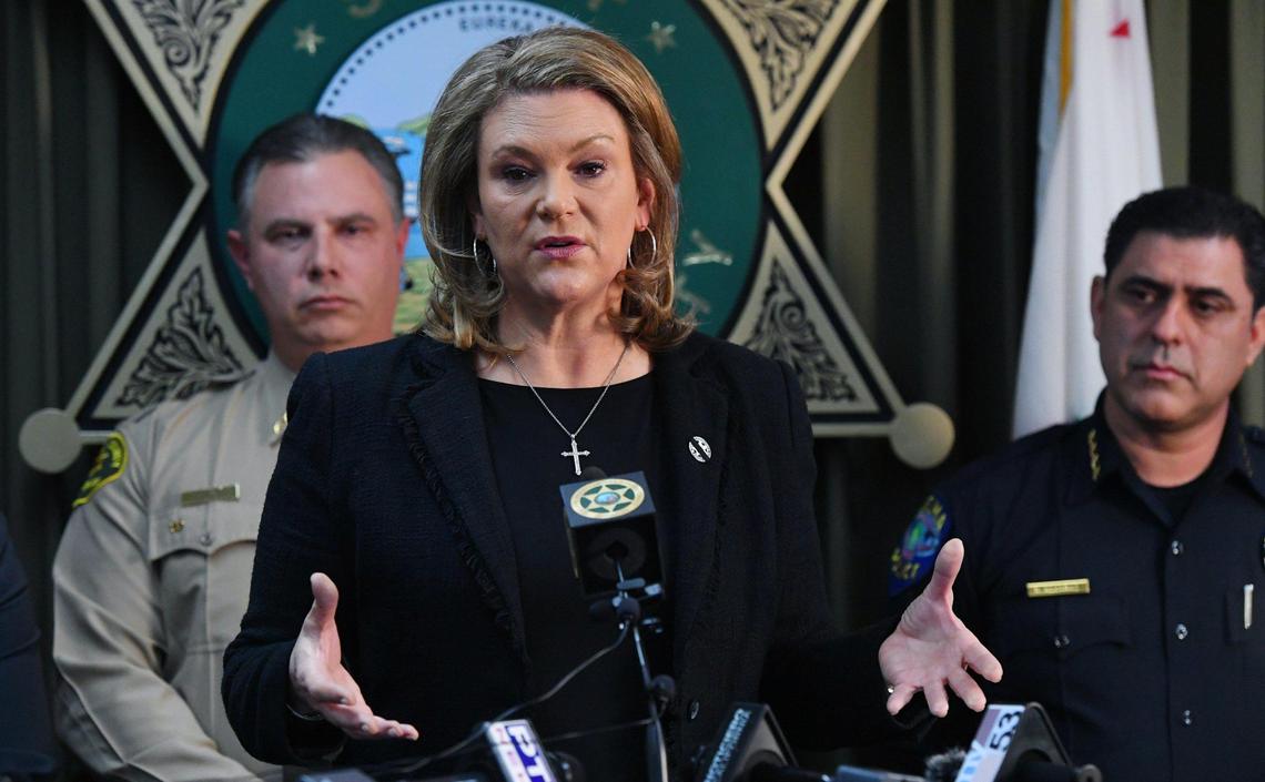 Fresno County District Attorney Lisa Smittcamp, center, with Fresno County Sheriff John Zanoni, left, and Selma Police Chief Rudy Alcaraz, right, speak at a press conference Friday, Feb 3, 2023 in Fresno. Measure A will ask voters to weigh in on election cycles for the district attorney and and sheriff.