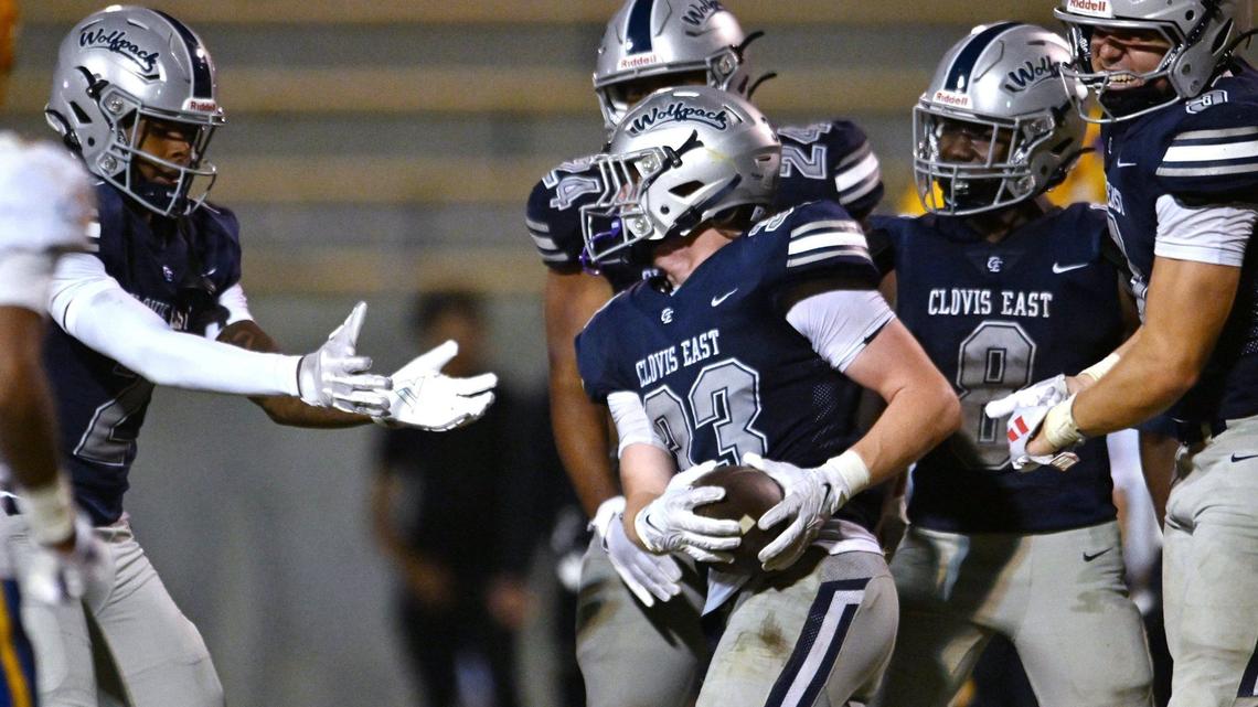 Clovis East celebrates Jax Koontz’s interception, center, against Grant Union Friday, Sept. 13, 2024 in Clovis.