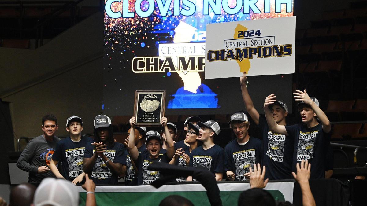 Clovis North celebrates its 69-60 win over St. Joseph in the Central Section Division I basketball championship Saturday, Feb. 24, 2024 at Selland Arena in Fresno.