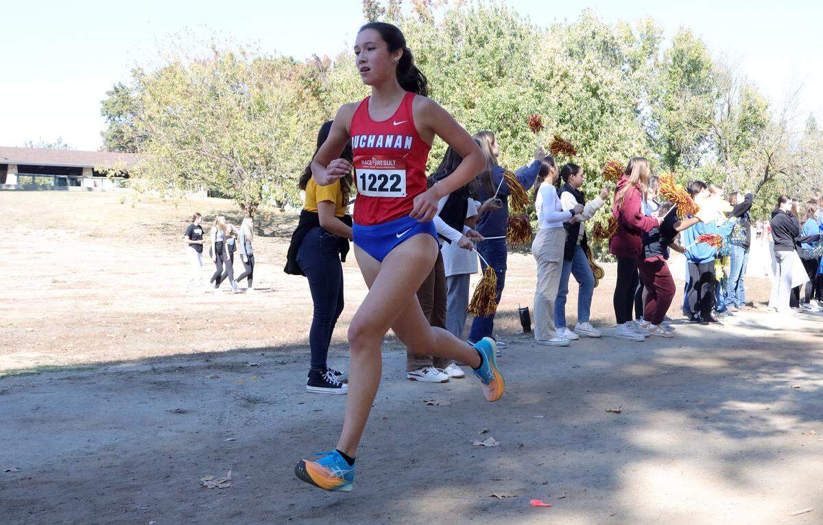Buchanan High junior Sierra Cornett (2nd, 18:06.12) pushes on with about a mile left in the TRAC cross country championships at Woodward Park on Nov. 9, 2023.