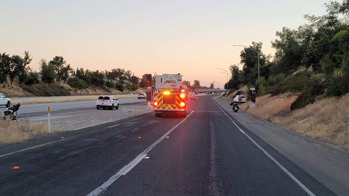 The Bullard Avenue on-ramp to Highway 168 is blocked as the California Highway Patrol investigates a fatal crash involving a motorcycle Friday, June 11, 2021, in Clovis, California.