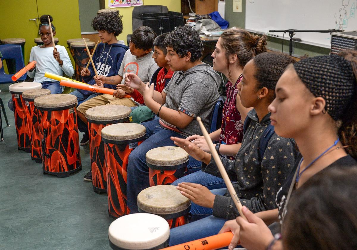 Kirk Elementary School sixth graders participate in a drum circle class on Wednesday, May 9, 2019.