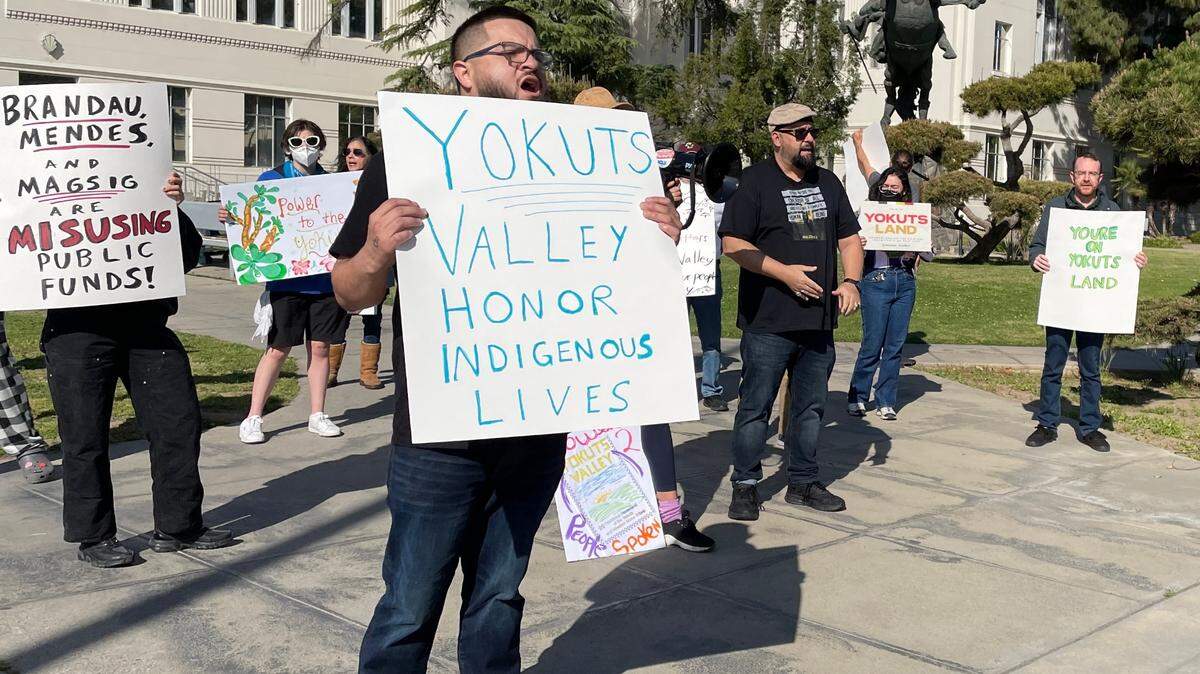 Fresno County residents show their support of the name Yokuts Valley and call on the Board of Supervisors to throw out its “frivolous” lawsuit against the state of California in downtown Fresno on April 11, 2023.