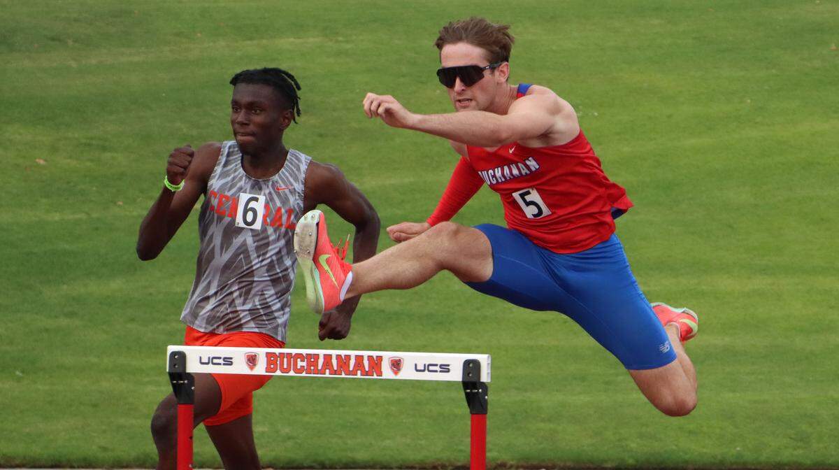 Buchanan High senior Hudson Hergenrader gets ready to clear a hurdle midway through the boys 300-meter hurdles to win his heat in 38.19 seconds at the CIF Central Section Masters Track and Field Championships at Buchanan High’s Veterans Memorial Stadium on May 24, 2025.