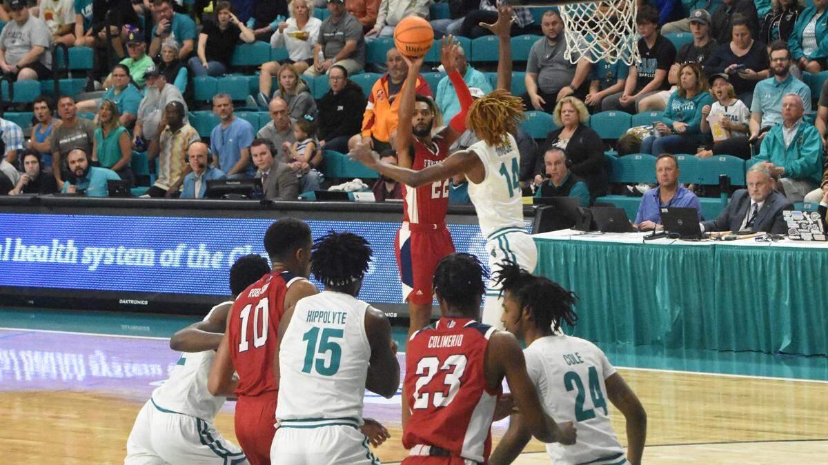 Fresno State guard Destin Whitaker knocks down a 3-pointer in the Bulldogs’ 85-74 victory over Coast Carolina on Friday in the championship game of The Basketball Classic in Conway, S.C. Whitaker hit all six of his shots in the victory, all from the 3-point line, in scoring a career-high 18 points.