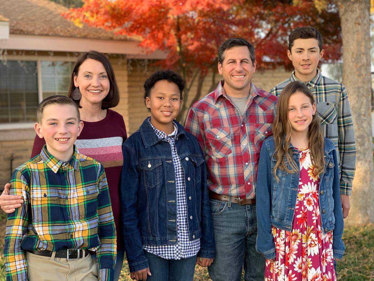Retired BMX rider Randy Stumpfhauser poses with his family. 