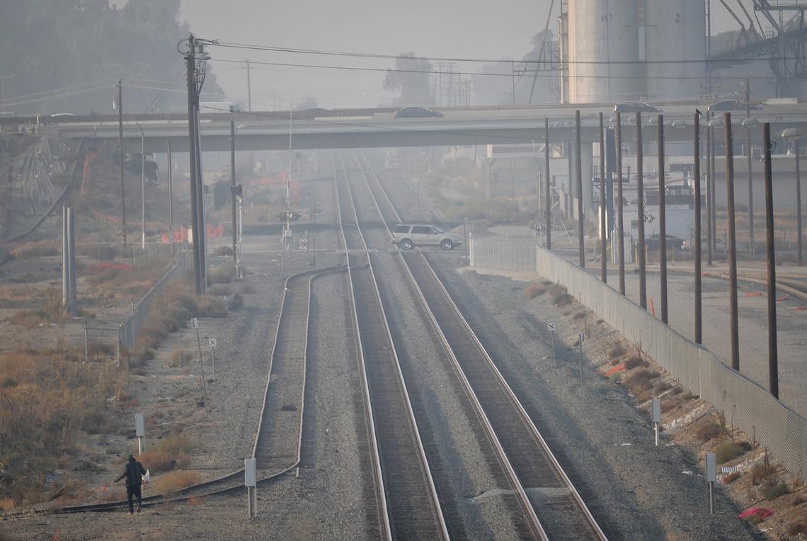 Smoky air from the Camp Fire is evident in Fresno, looking north from the Stanislaus Street overpass, Friday afternoon, Nov. 16, 2018.