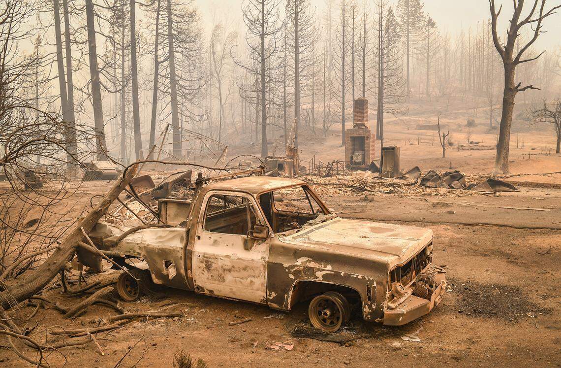 A destroyed home across the street from Pine Ridge School near Highway 168 and west of Shaver Lake is seen after the Creek Fire ravaged the area late Monday.