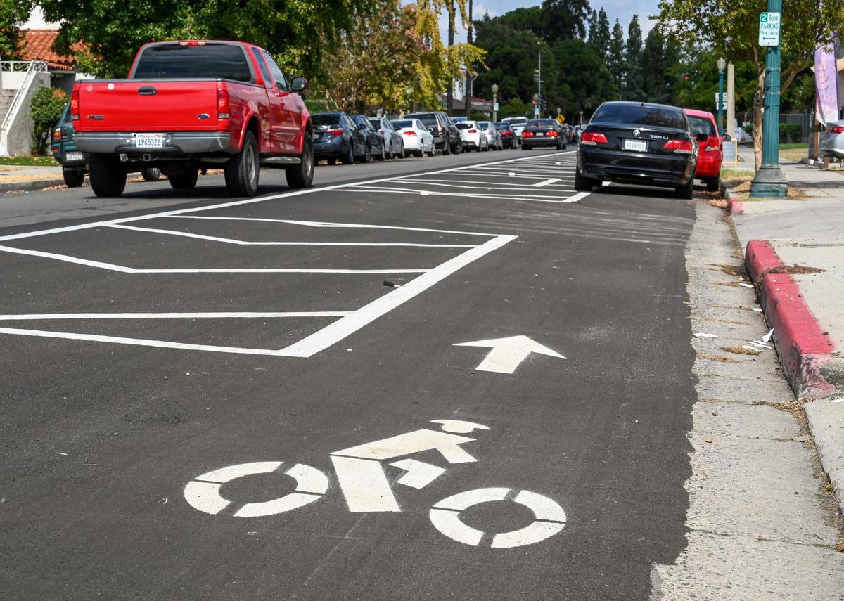 A cycling road marking shows a new bike lane located on Van Ness Avenue near Floradora Avenue. Due to complaints about the loss of parking spaces, city officials plan to “reshape” some sections.