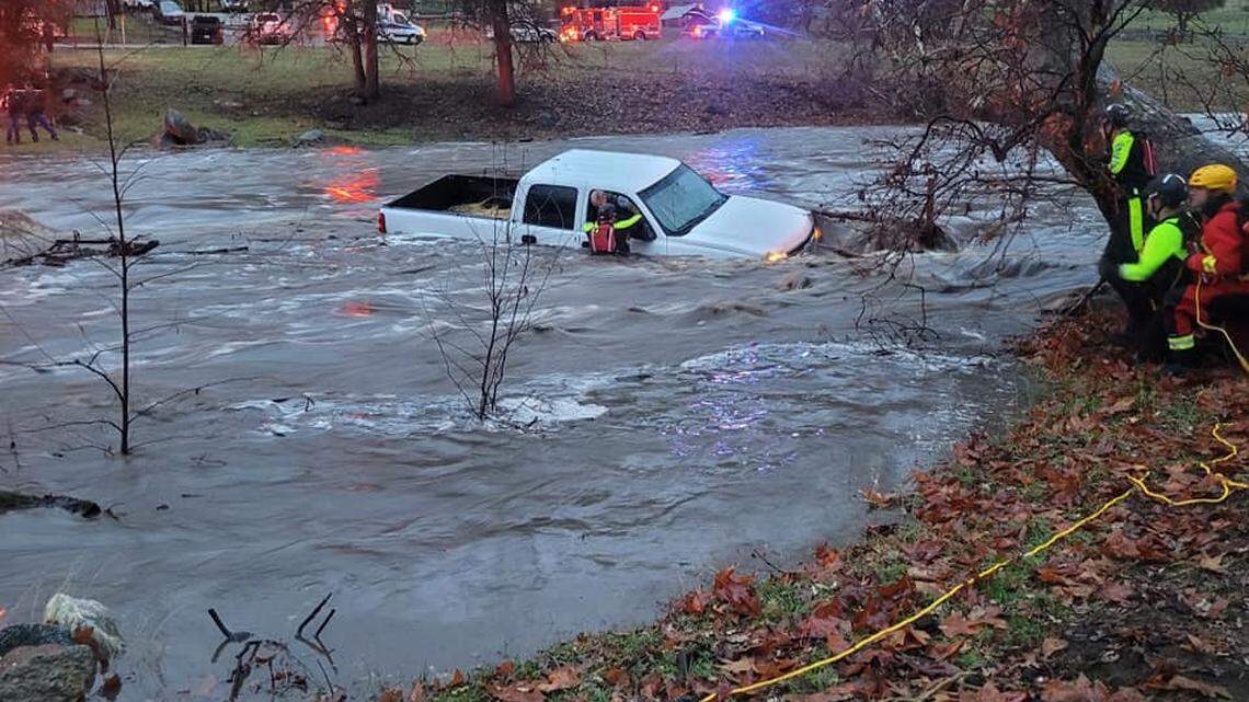 Authorities rescued a man after he was stuck in a truck because the roadway became flooded at Fresno County foothills on Saturday, Dec. 31, 2022.