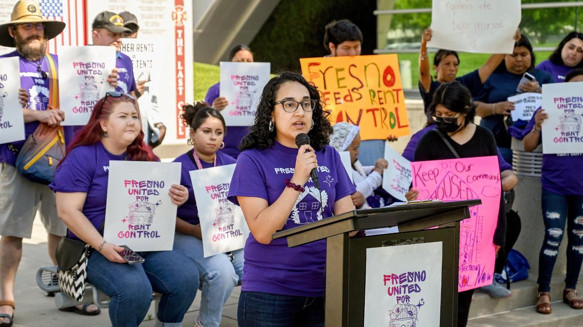 Marisa Moraza, campaign director for Power California Action, speaks during a rally among a coalition of unhoused, youth, families, and faith leaders urging council members and the mayor to address the housing crisis, including rent control and tenant protections and pass immediate, long-term housing solutions, outside Fresno City Hall on Thursday, April 27, 2023.