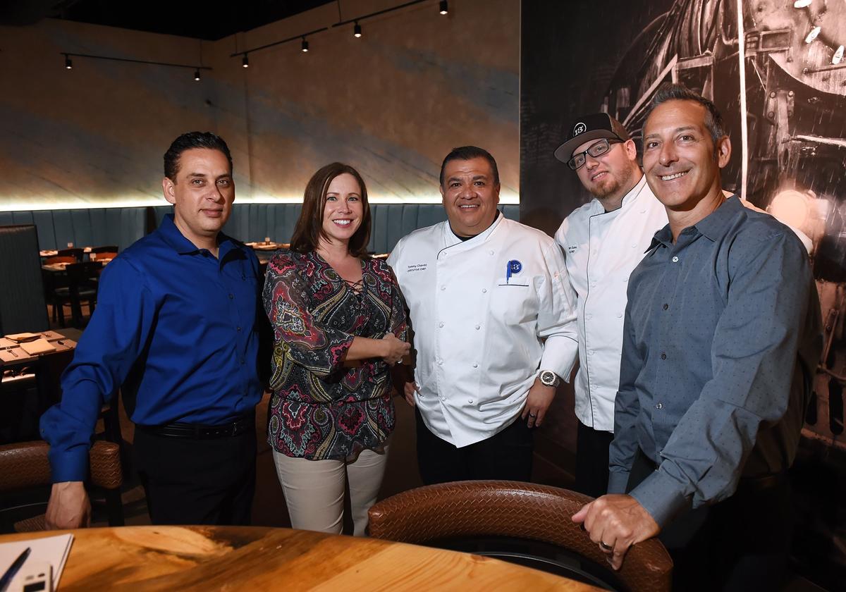 Owners John Marihart and Falinia Marihart, left, stand with executive chef Tommy Chavez, center, sous chef James Gunn, second from right, and Jason Quigley, right, at 13 Prime Steak, a new steakhouse, photographed Wednesday, Aug. 22, 2018 in Clovis.