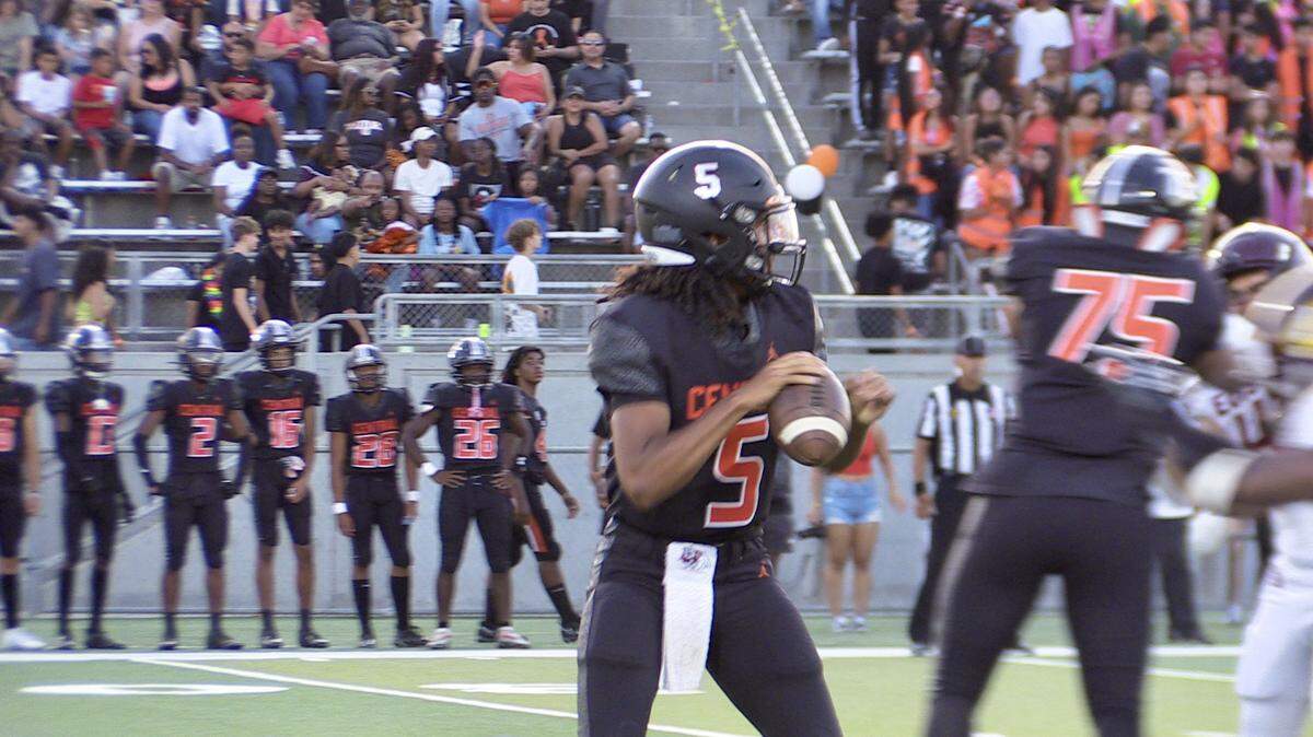 Central quarterback Earl Riley attempts a pass against Edison-Stockton on Friday, Aug. 18, 2023. The Grizzlies won 48-13.
