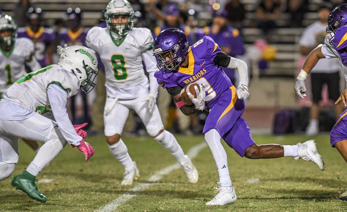 Fresno’s Nehemiah White charges up the middle on a run against Roosevelt during the 92nd annual Little Big Game between the two schools at Ratcliffe Stadium in Fresno on Friday, Oct. 28, 2022.