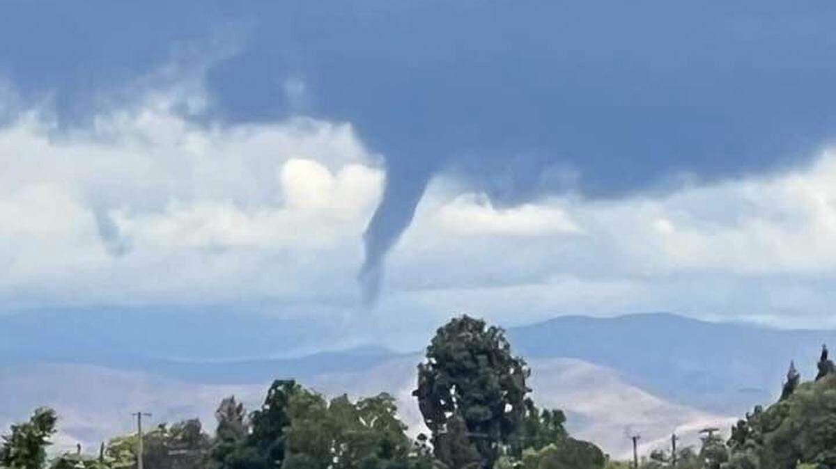 A funnel cloud is seen near Sanger, California, on Thursday, May 4, 2023.