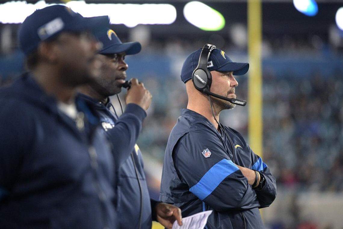 Former Los Angeles Chargers defensive coordinator Gus Bradley, right, stands next to former coach Anthony Lynn during a game against the Jacksonville Jaguars in December 2019. Bradley will be entering his first season as the Las Vegas Raiders defensive coordinator.