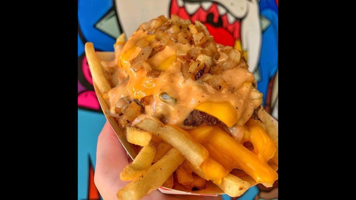 The Flippin’ fries at Flippin’ Dave’s come with two slices of melted American cheese, grilled onions and two burger patties with a slice of cheese in the middle, with Dave’s sauce (its signature sauce made in house) on top of it all.&nbsp;